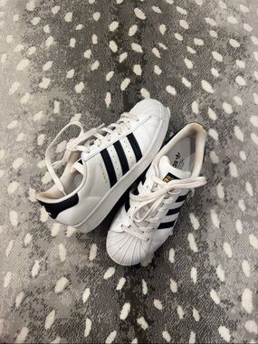 adidas women’s White Sneakers with Black Stripes